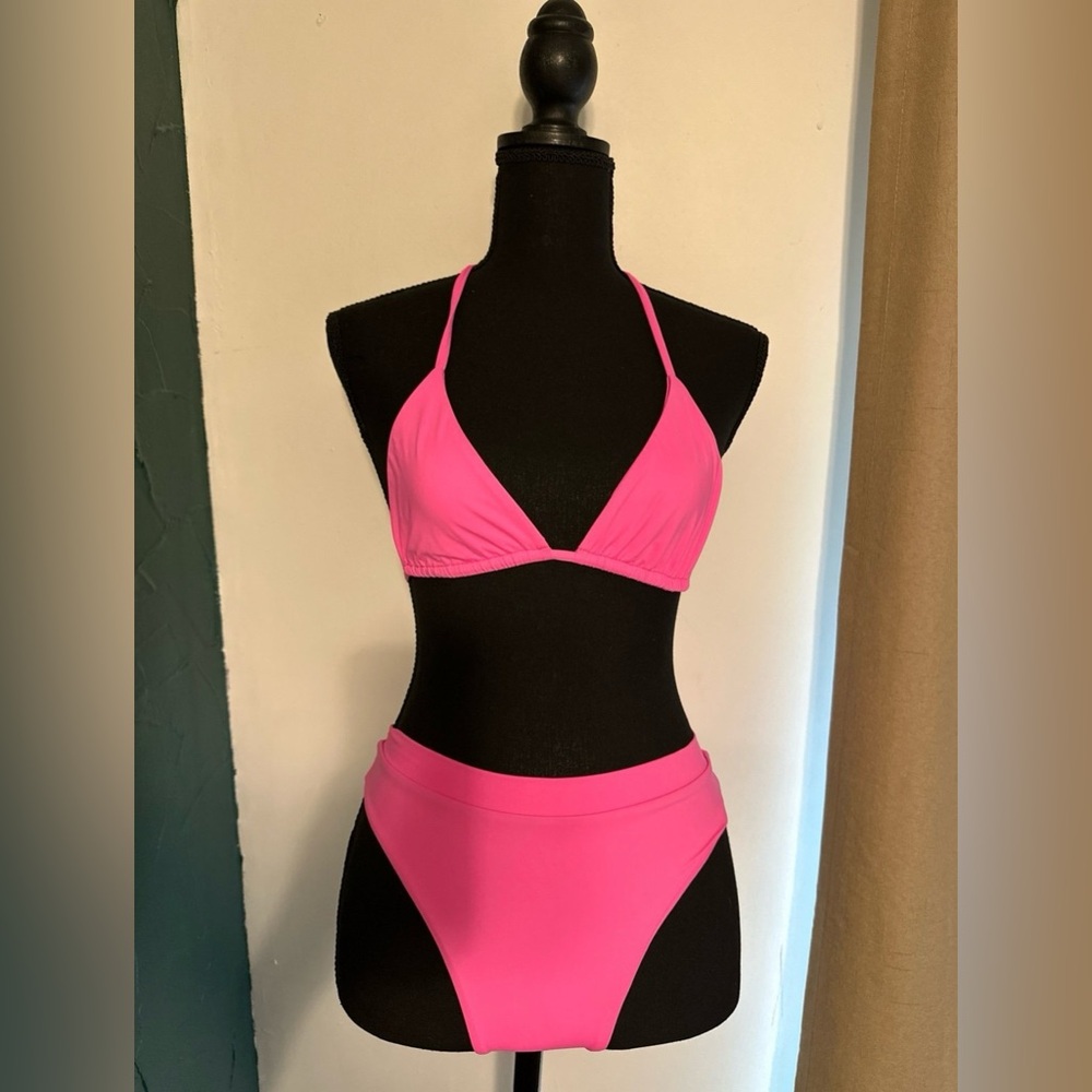 Frankie’s bikinis top is size large but fits like a small bottom are a small.